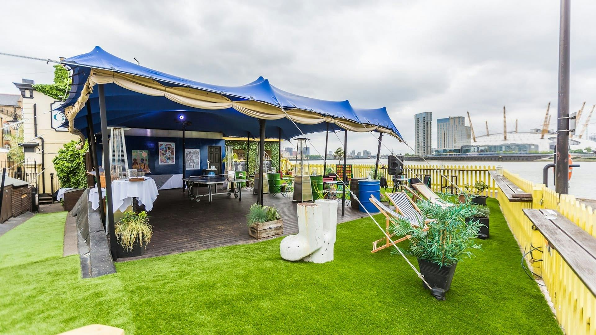 The Gun's Gin Garden with deck chairs and The 02