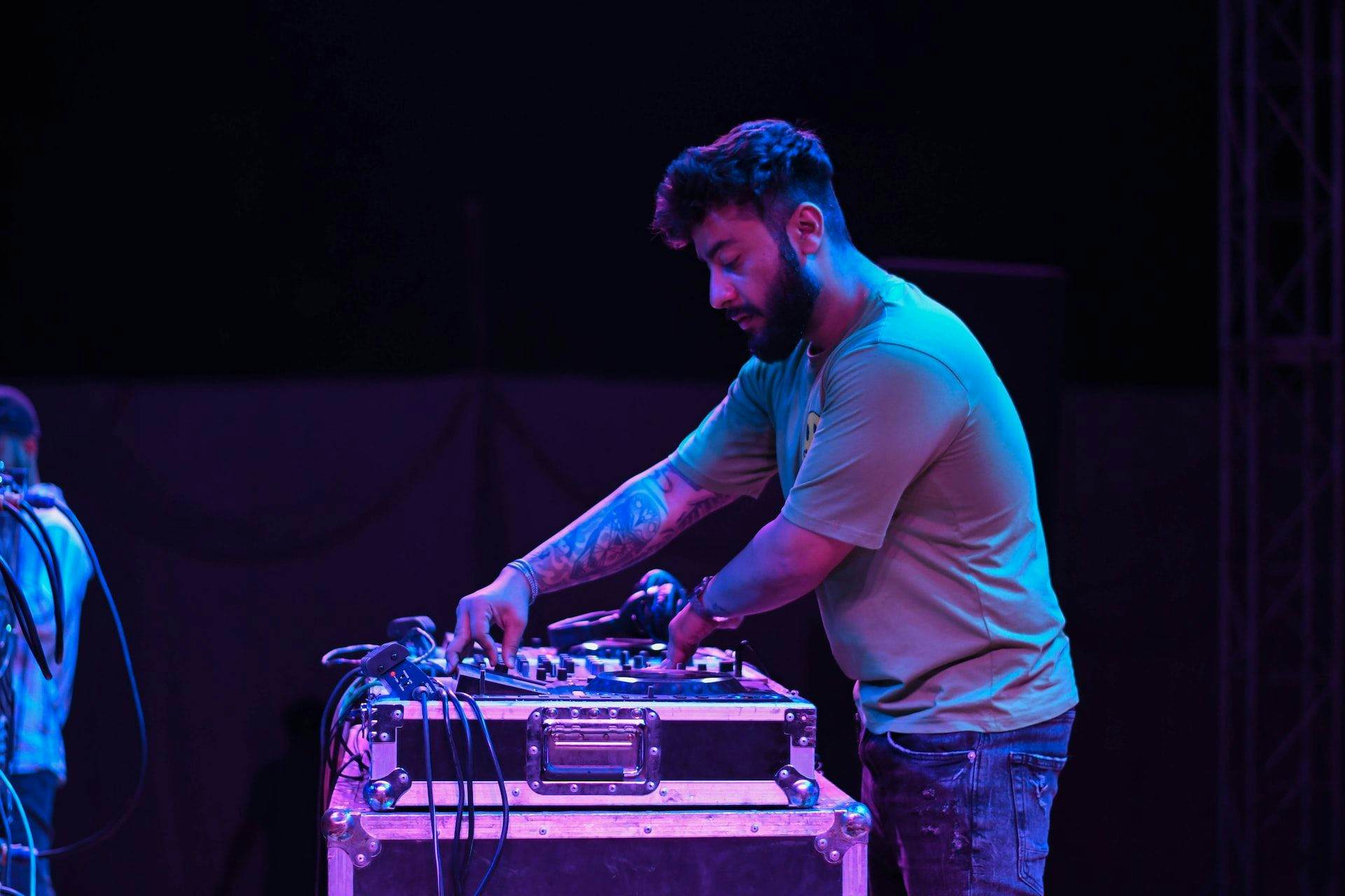 man using audio equipment at event