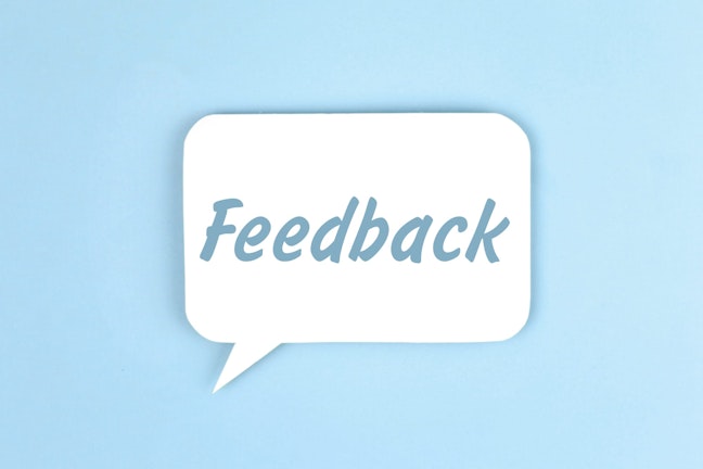 Blue background with speech bubble saying "feedback"