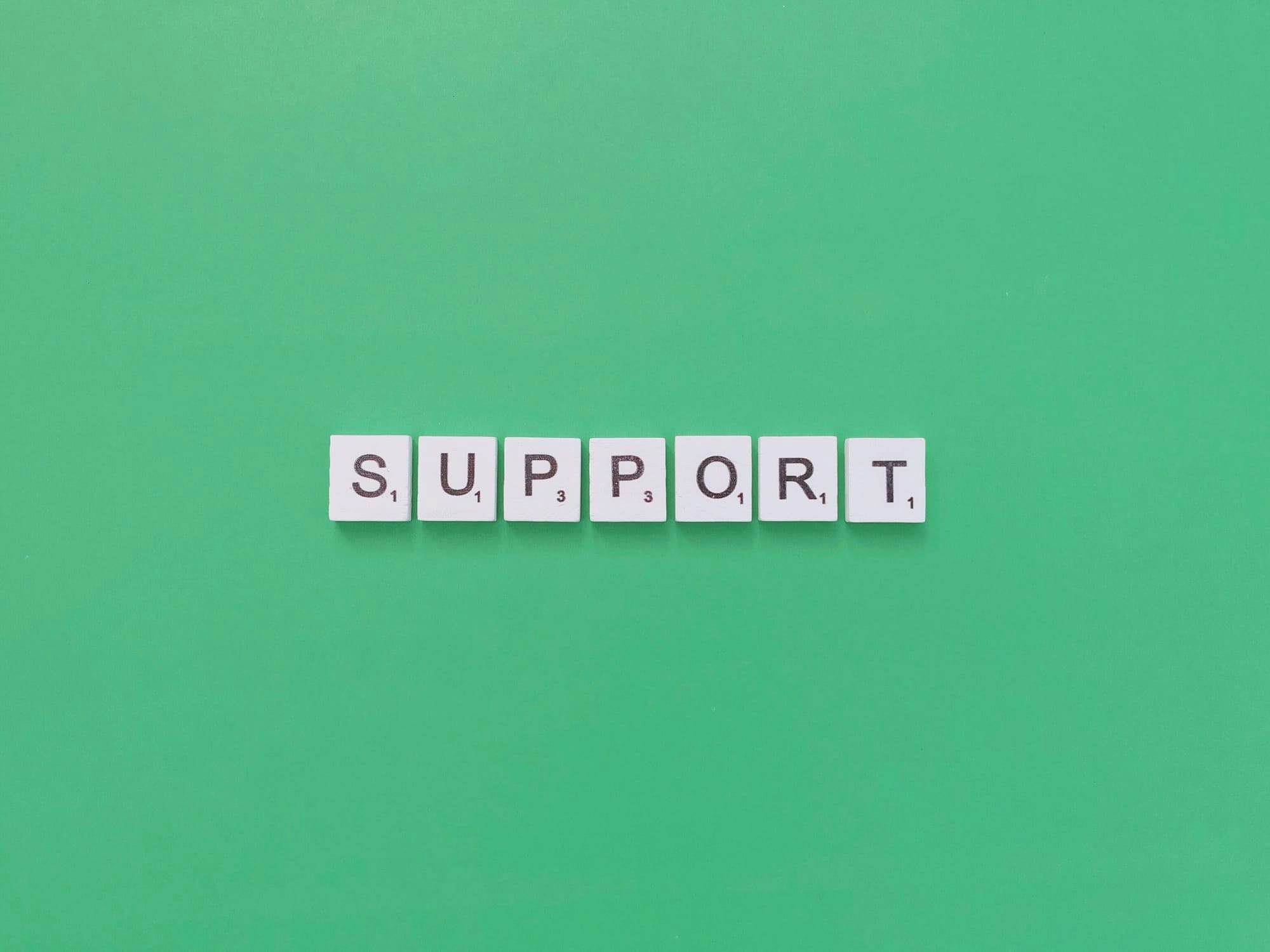 Word "Support" with green background