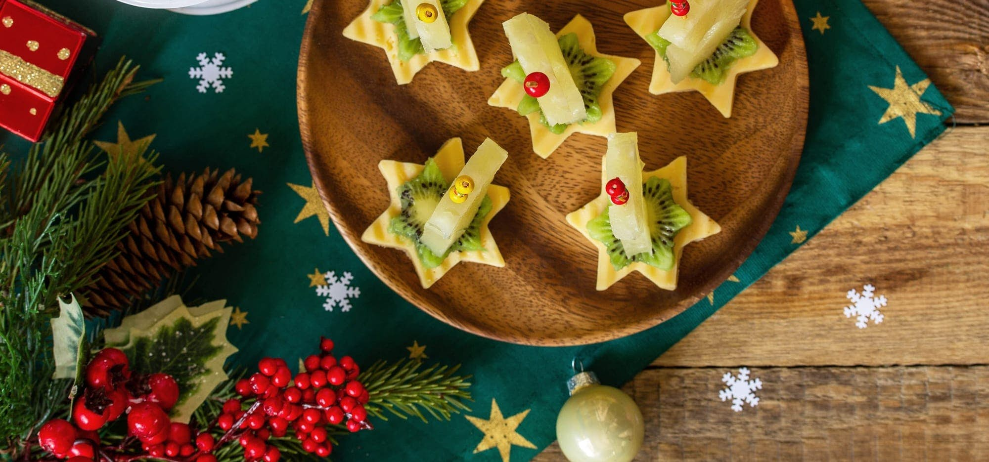 christmas decor on table with fruit stars platter